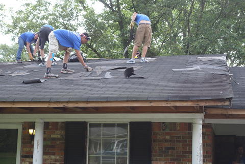 Tearing down the old roof