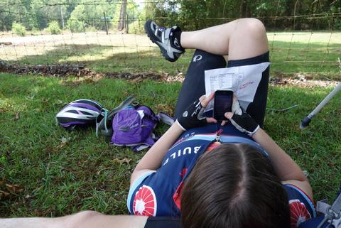 Helen napping under a tree