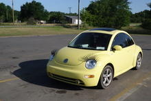 VW bug with eyelashes. 